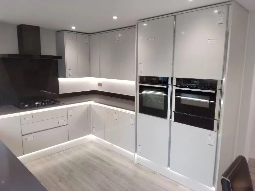Tall kitchen cabinets and appliance housings in Jamie’s installation
